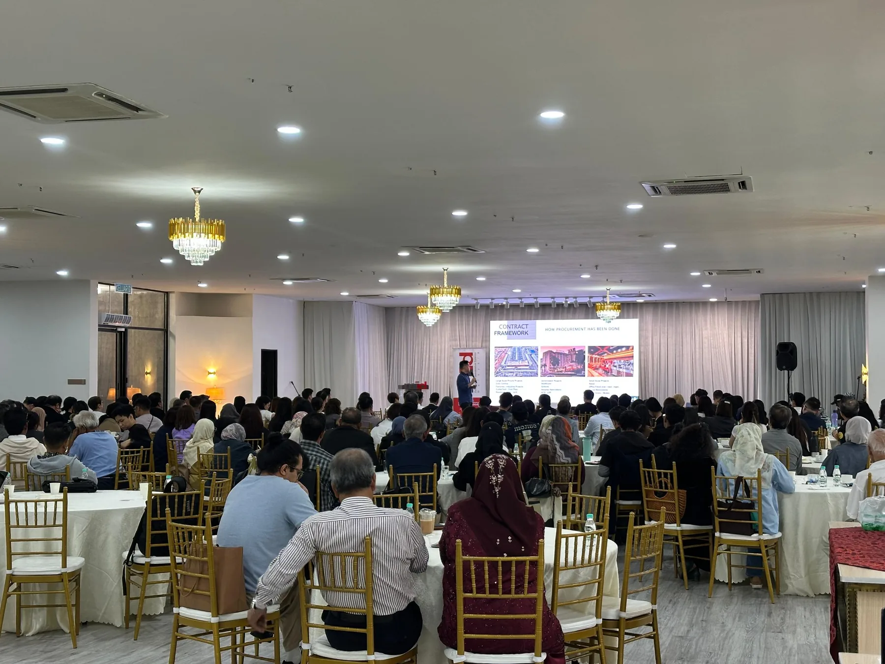 Corporate conference audience and presenter